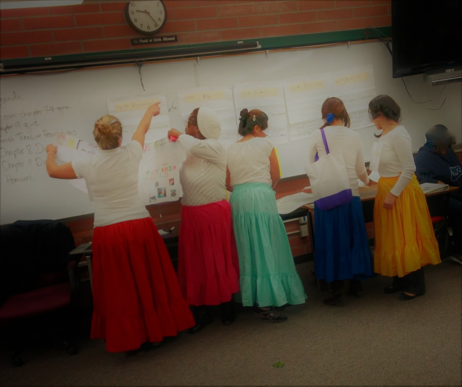 A group of students presenting a story together in a classroom